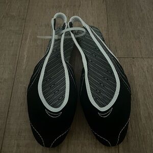 Puma Black and White Flats with Sporty Design